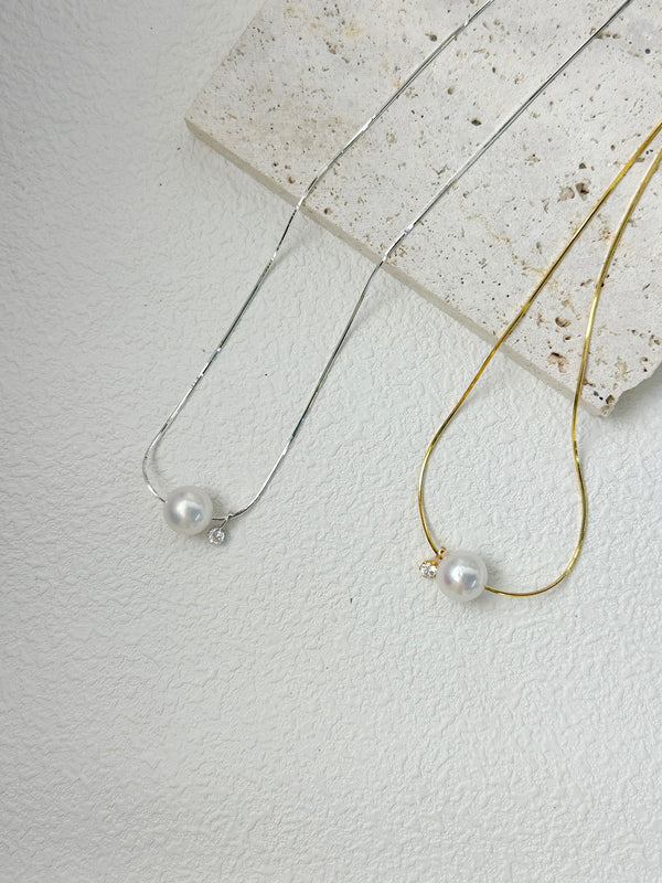Sterling Silver Pearl - adorned rolling beads Necklace: Timeless Elegance